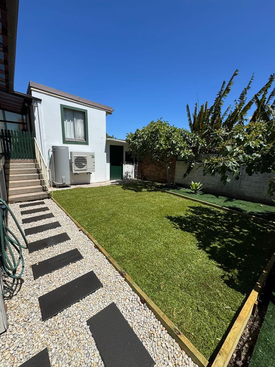 After - Yard transformation from concrete to lawn
