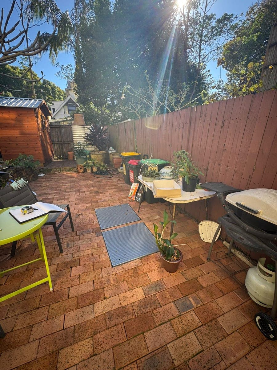 Before - Corner planter with timber screen