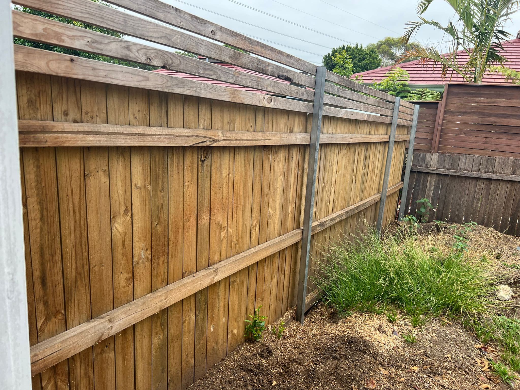 Premium artificial turf installation providing year-round green lawn