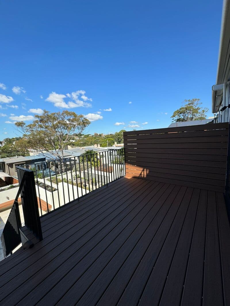 Detail view: Corner junction of composite decking showing clean installation