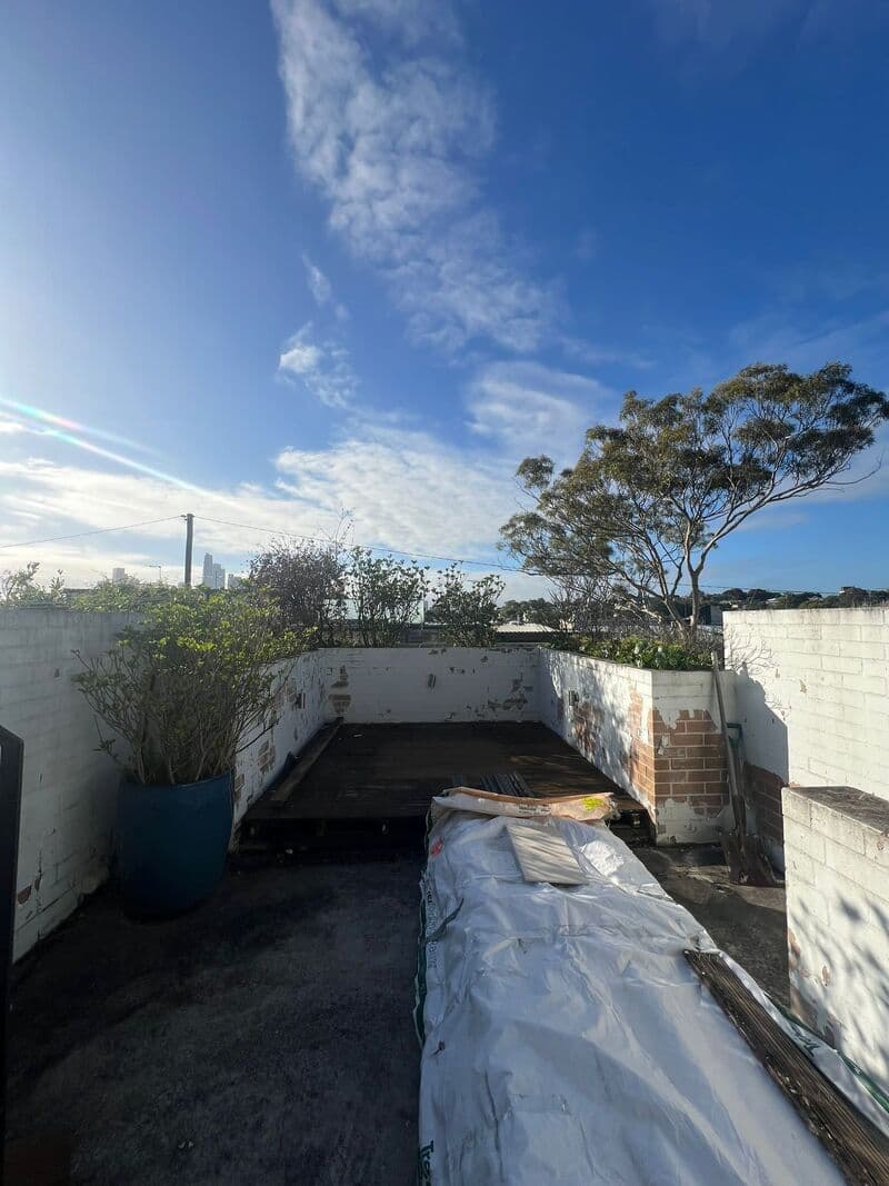 Before - Transformation of the main outdoor area with new composite bench and tiling