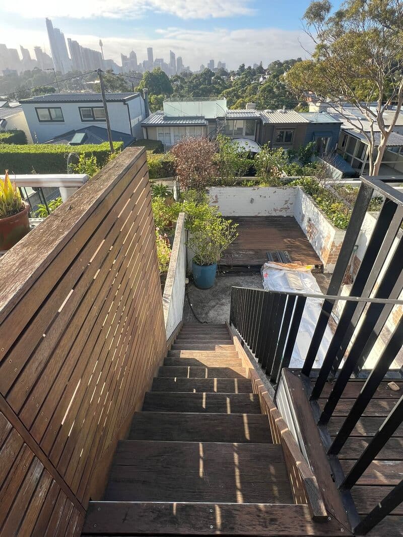 Custom planter box with fresh plantings adding greenery to the space