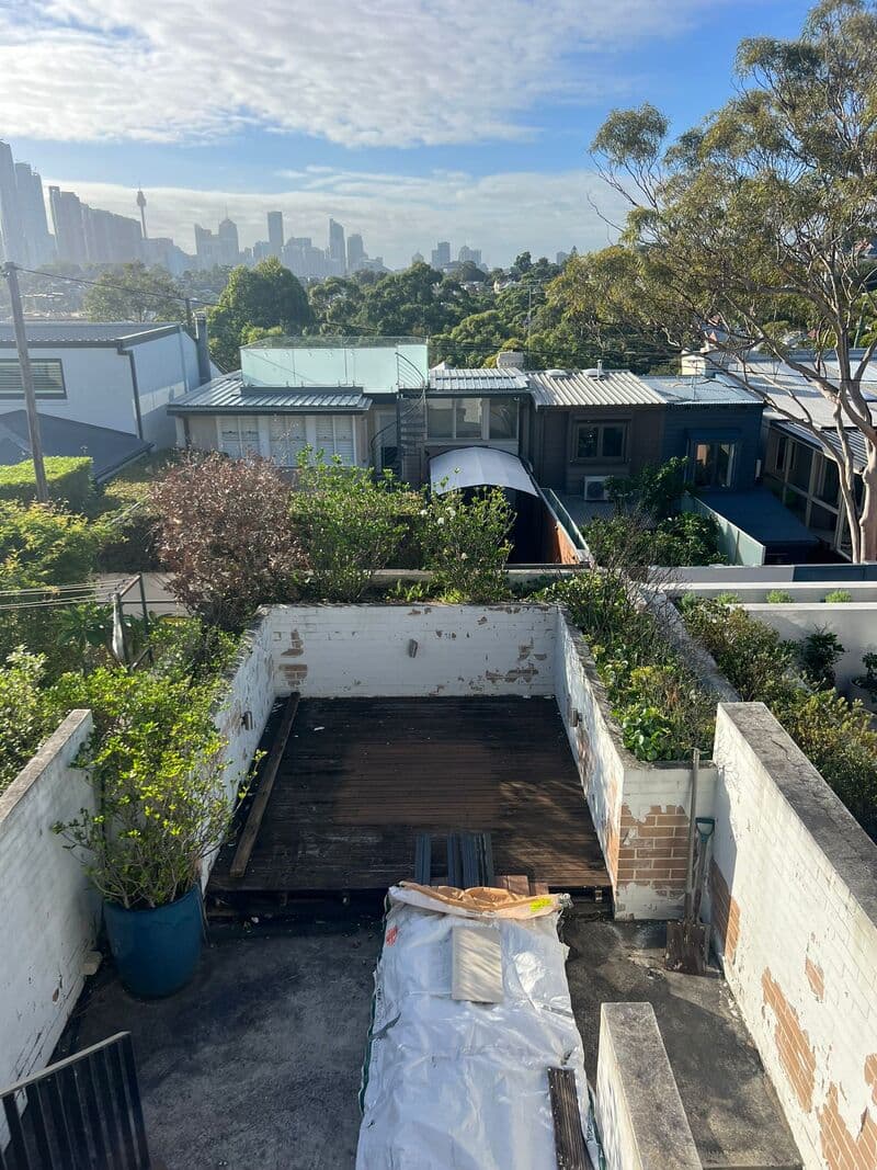 Before - Addition of custom planter box and greenery to enhance the urban space