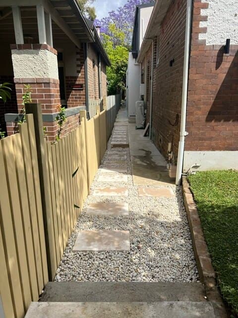 Close-up of the stepping stone pathway with white Cowra pebbles