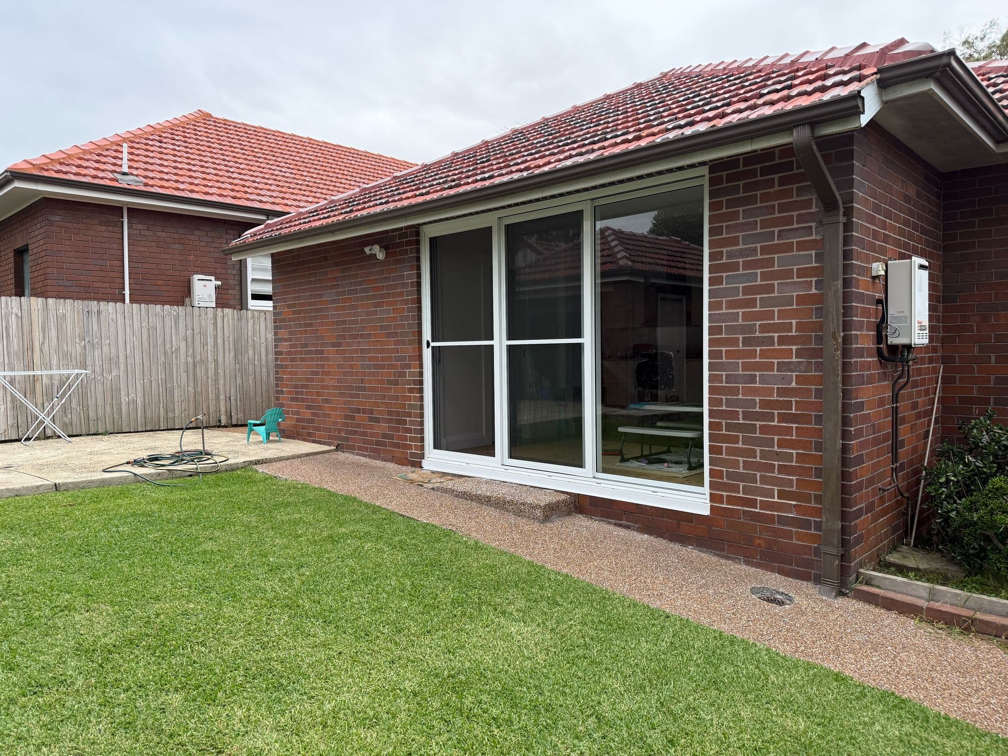 Before - Addition of the insulated pergola providing year-round comfort and weather protection
