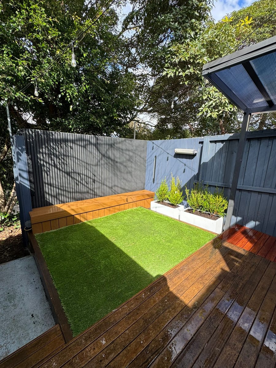 Rozelle courtyard with synthetic lawn, timber seating and decking