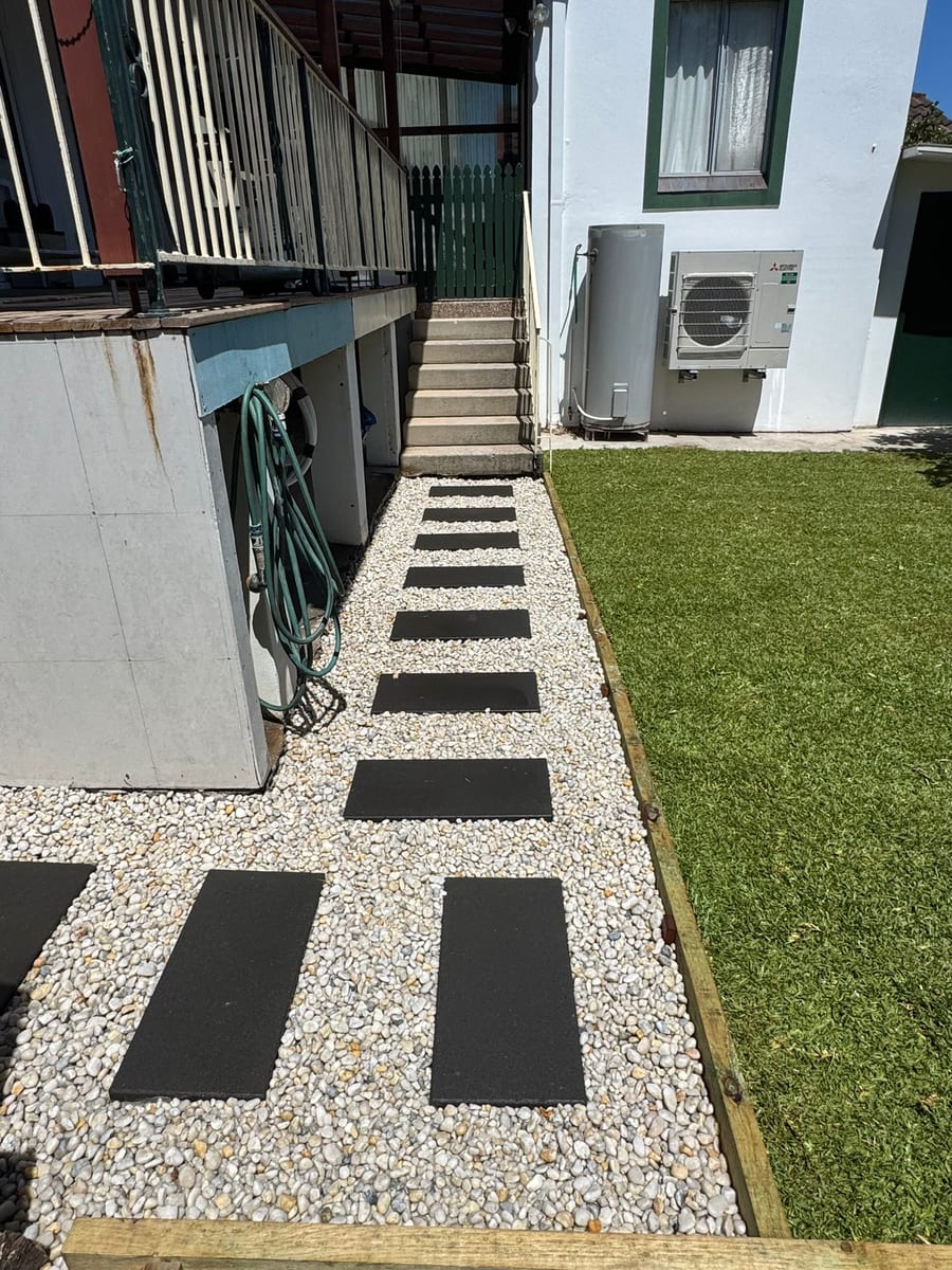 Stepping stones in gravel beside a new lawn in Dulwich Hill